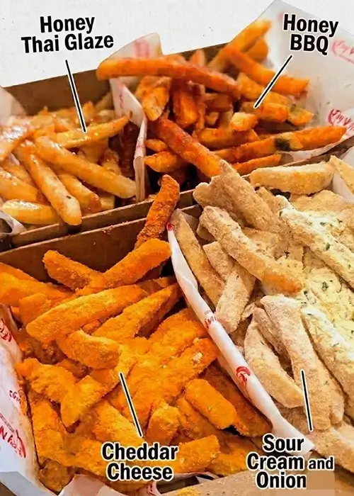 Fry N' Wings crispy flavored fries featuring Honey Thai Glaze, Honey BBQ, Cheddar Cheese, and Sour Cream and Onion